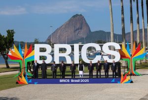 Leaders posing for a family photo at the 2025 BRICS Summit in Rio de Janeiro