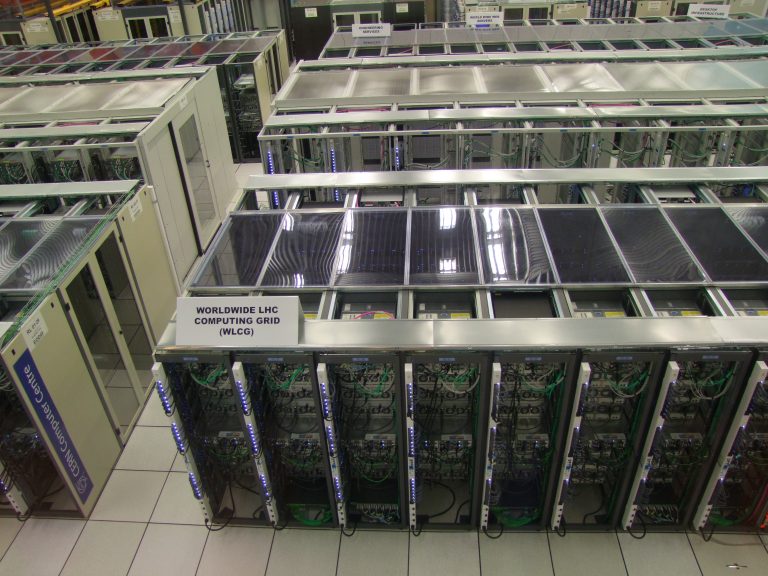Rows of servers mounted in racks inside a computing centre.
