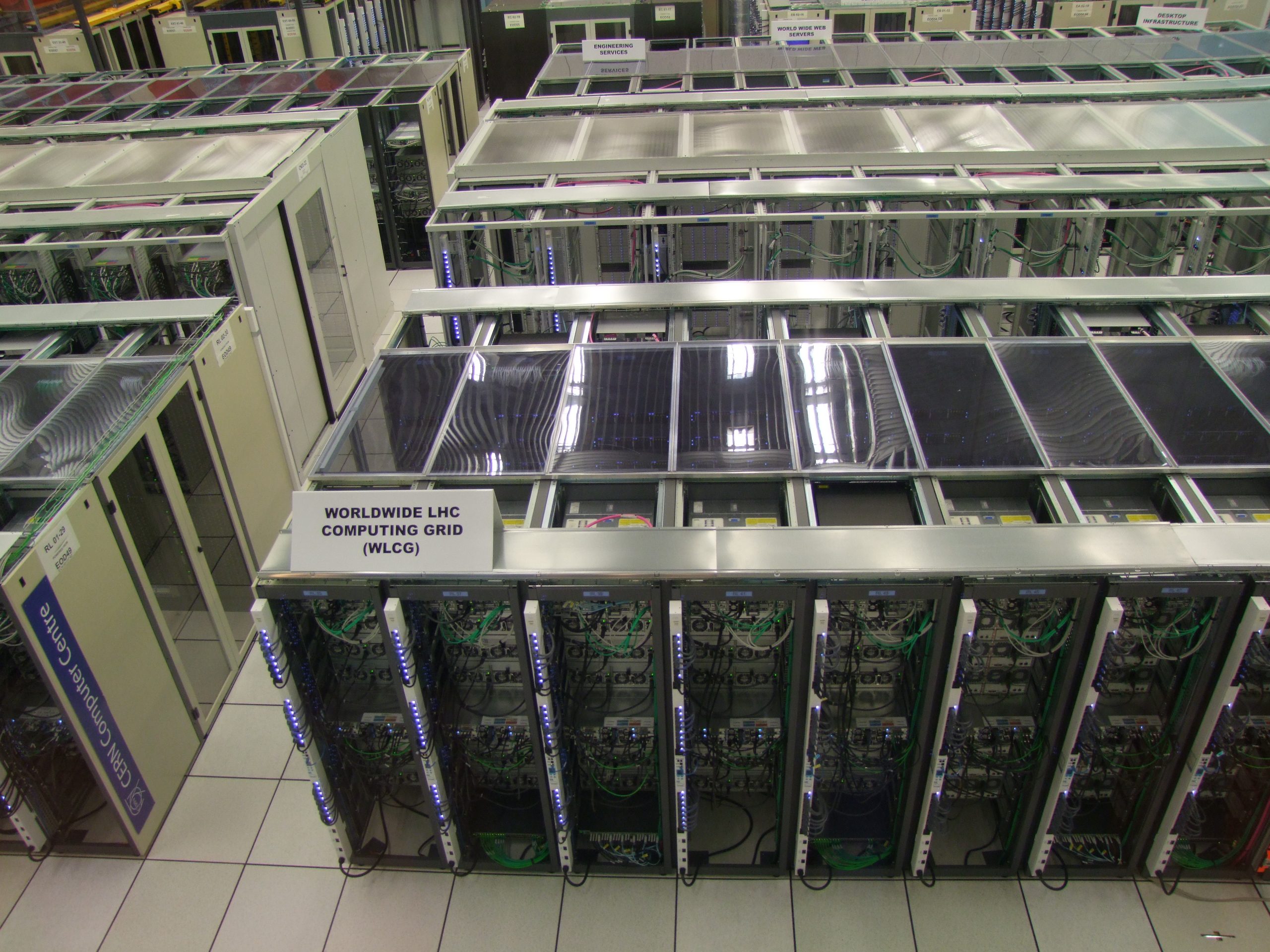 Server racks in a computing centre Rows of servers mounted in racks inside a computing centre.