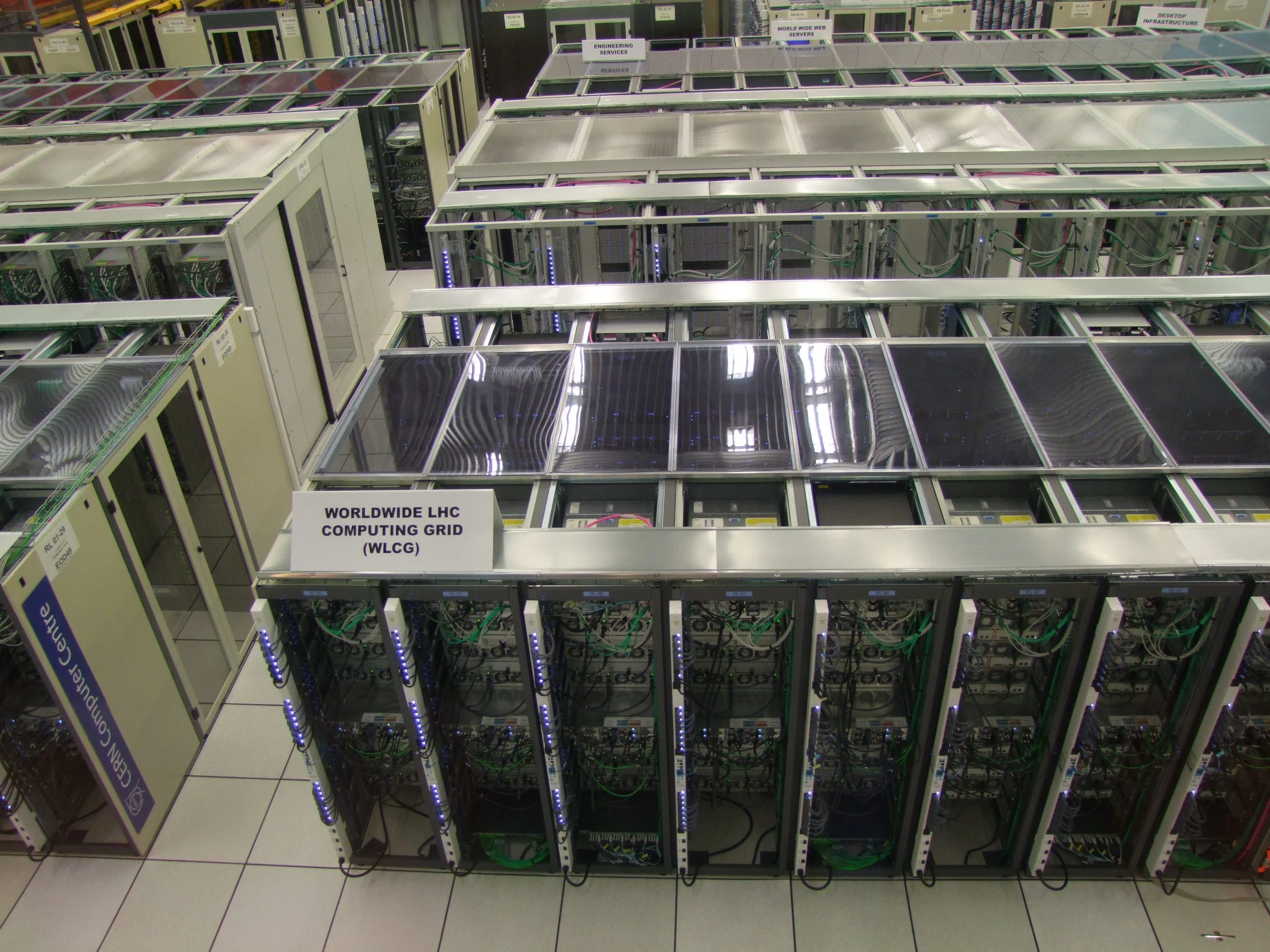 Rows of servers mounted in racks inside a computing centre.