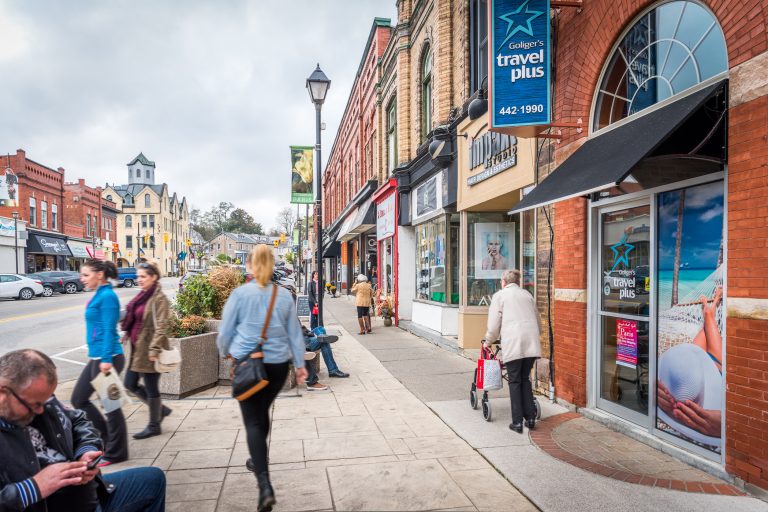 Shops and pedestrians along Grand River Street North in downtown Paris, Ontario