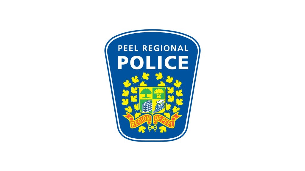 The Peel Regional Police crest: a blue shield reading PEEL REGIONAL POLICE above the Region of Peel coat of arms