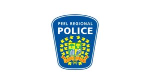 The Peel Regional Police crest: a blue shield reading PEEL REGIONAL POLICE above the Region of Peel coat of arms