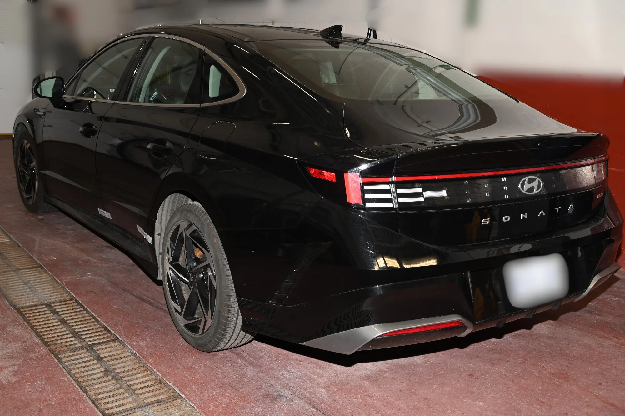 The same black 2025 Hyundai Sonata seized by Toronto police, seen from the rear.